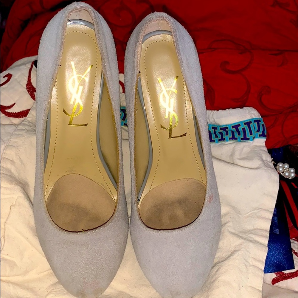 Beautiful suede YSL heels .